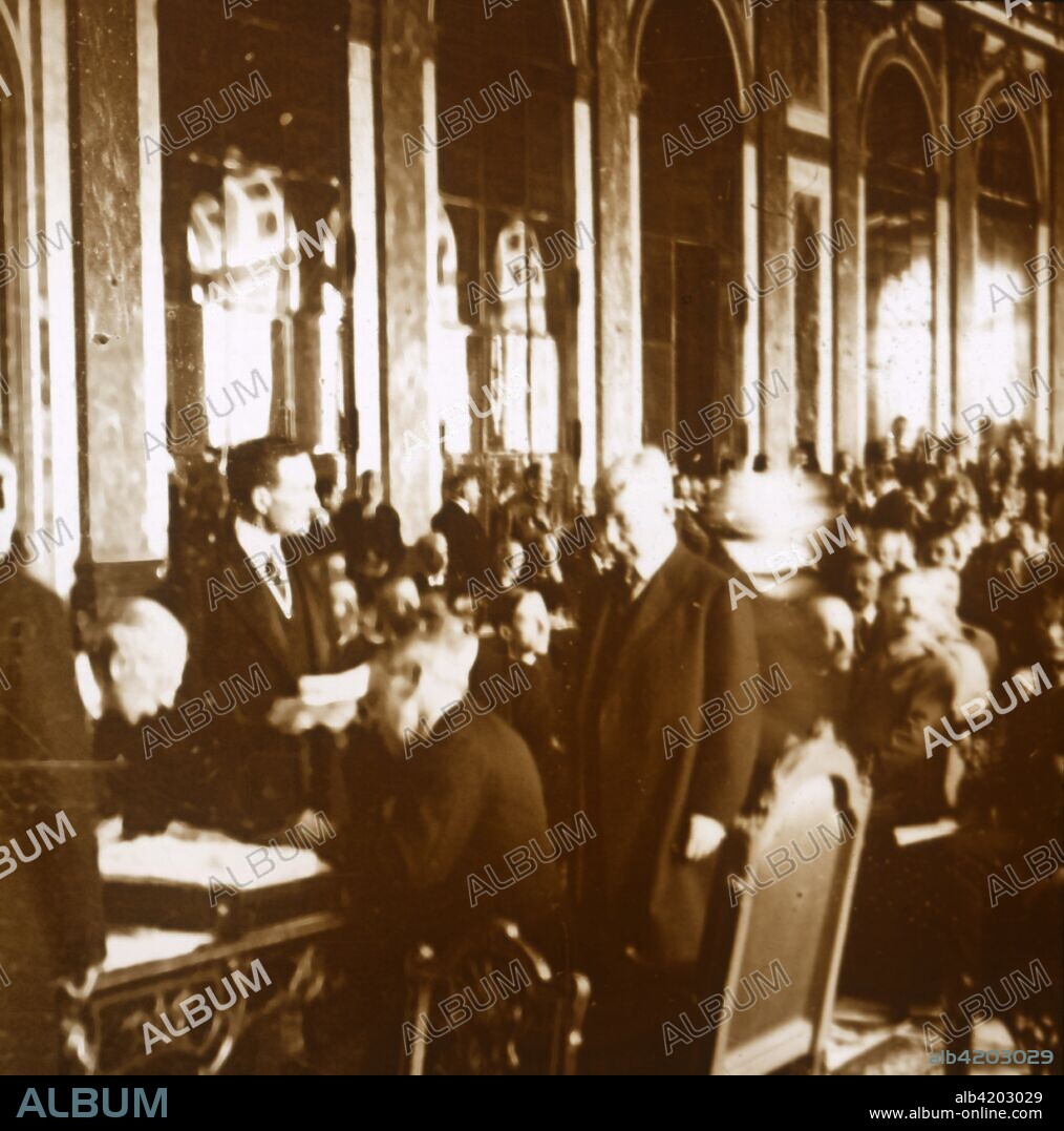 Woodrow Wilson, Treaty of Versailles, France, 1919. The Treaty of Versailles which brought World War I to an end was signed on 28 June 1919. Photograph from a series of glass plate stereoview images depicting scenes from World War I (1914-1918).