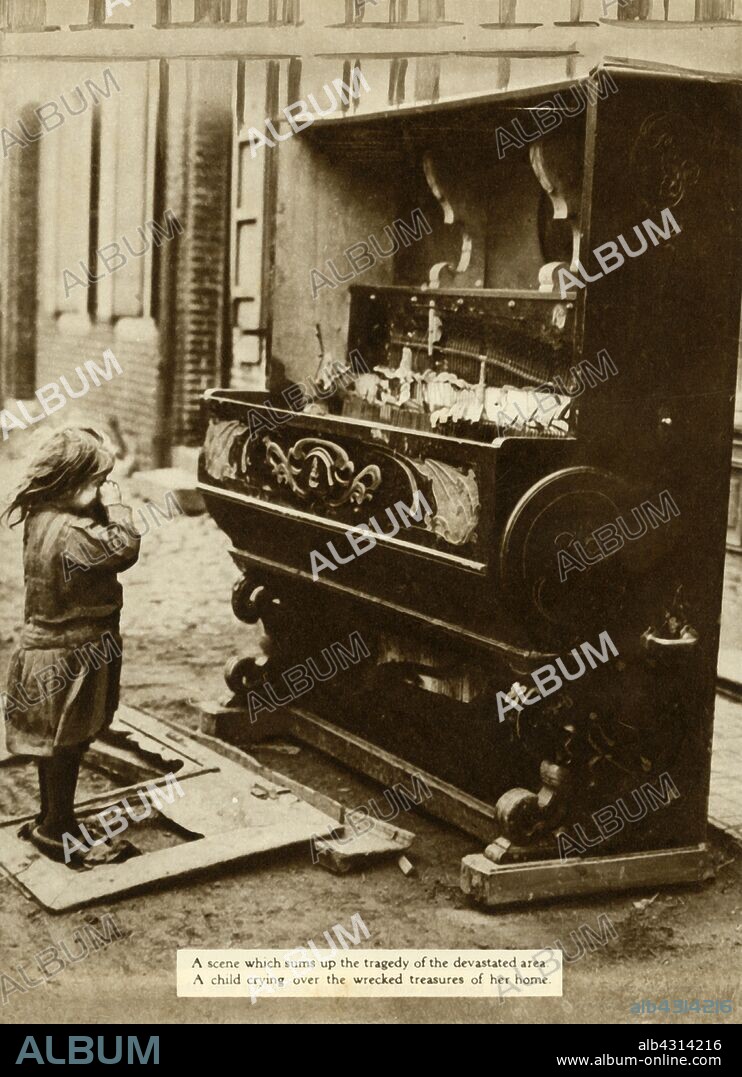 Child with damaged piano after an air raid made her homeless, First World War, 1918, (1935). 'A child crying over the wrecked treasures of her home'. From "The Silver Jubilee Book - The Story of 25 Eventful Years in Pictures". [Odhams Press Ltd., London, 1935].