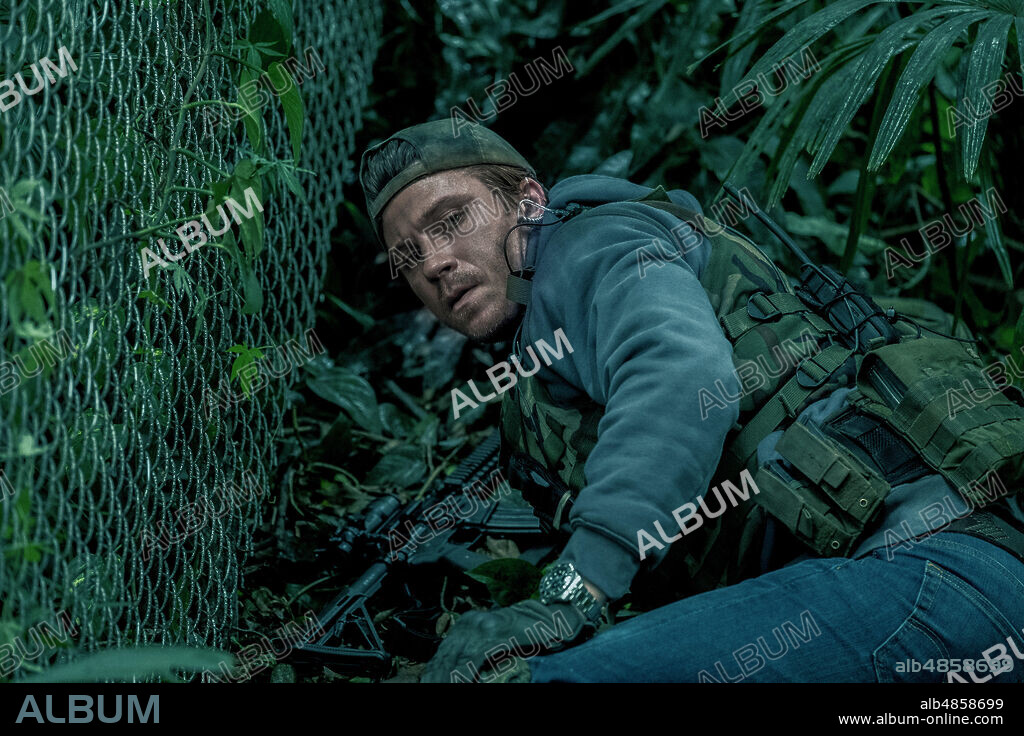 GARRETT HEDLUND in TRIPLE FRONTIER, 2019, directed by J. C. CHANDOR. Copyright ACQUIRE TALENT AGENCY/ATLAS ENTERTAINMENT.
