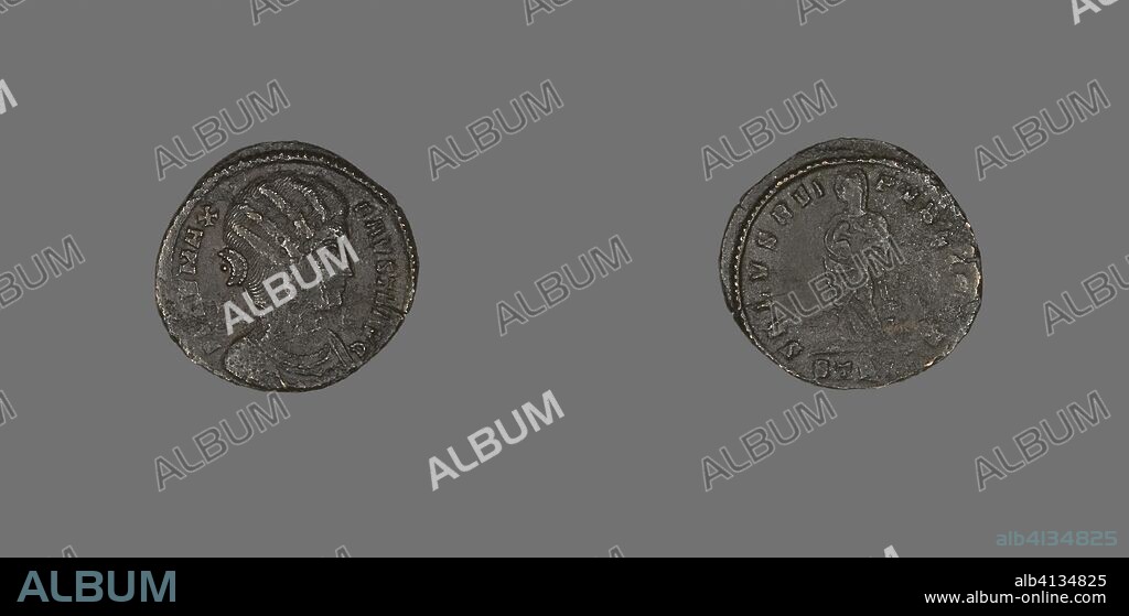ANCIENT ROMAN. Coin Showing Portraying Empress Fausta. Roman. Date: 307 AD-326 AD. Dimensions: DIam. 1.9 cm; 2.10 g. Bronze. Origin: Roman Empire.