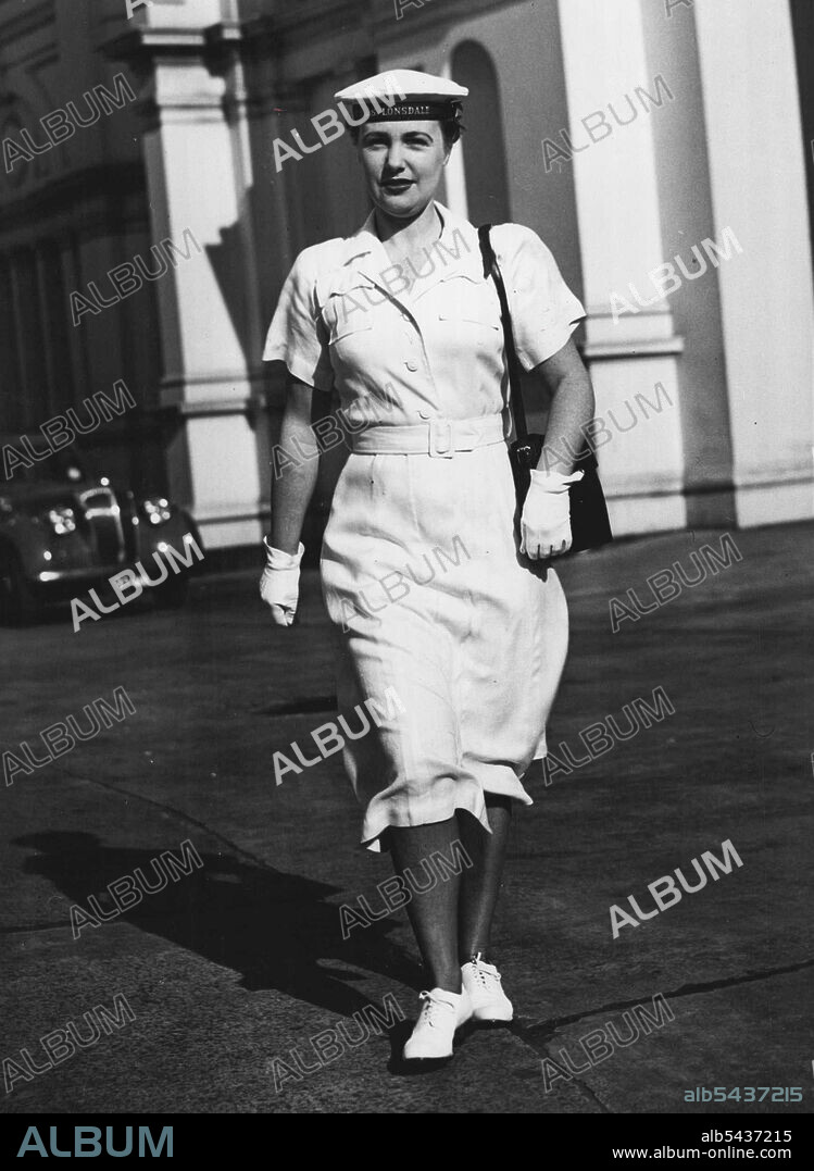 WRAN Valerie Casey, in the WRAN moygashel linen summer uniform ***** has been in the WRAN'S 15 months, and like Muriel, is a ***** drafting men to sea. She used to be an accounts machinist from East St. Kilda. October 22, 1954.