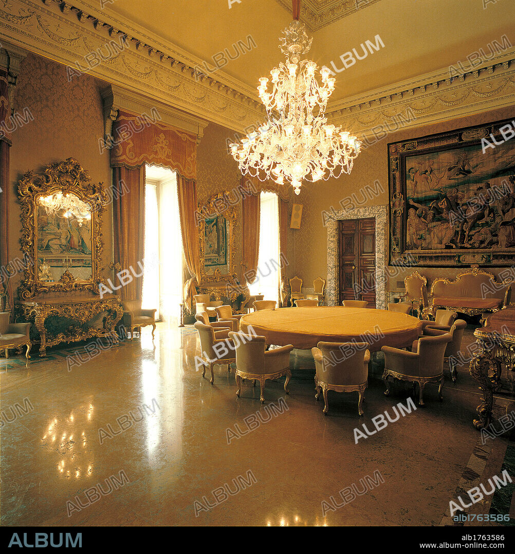 Palazzo Koch (Banca dItalia), by Gaetano Koch, 1888-1892, 19th Century,. Italy, Lazio, Rome, Palazzo Koch. Salon hall golden furniture console tapestry hanging mirror table chairs chandelier door windows decoration stuccoes curtains couch gold.