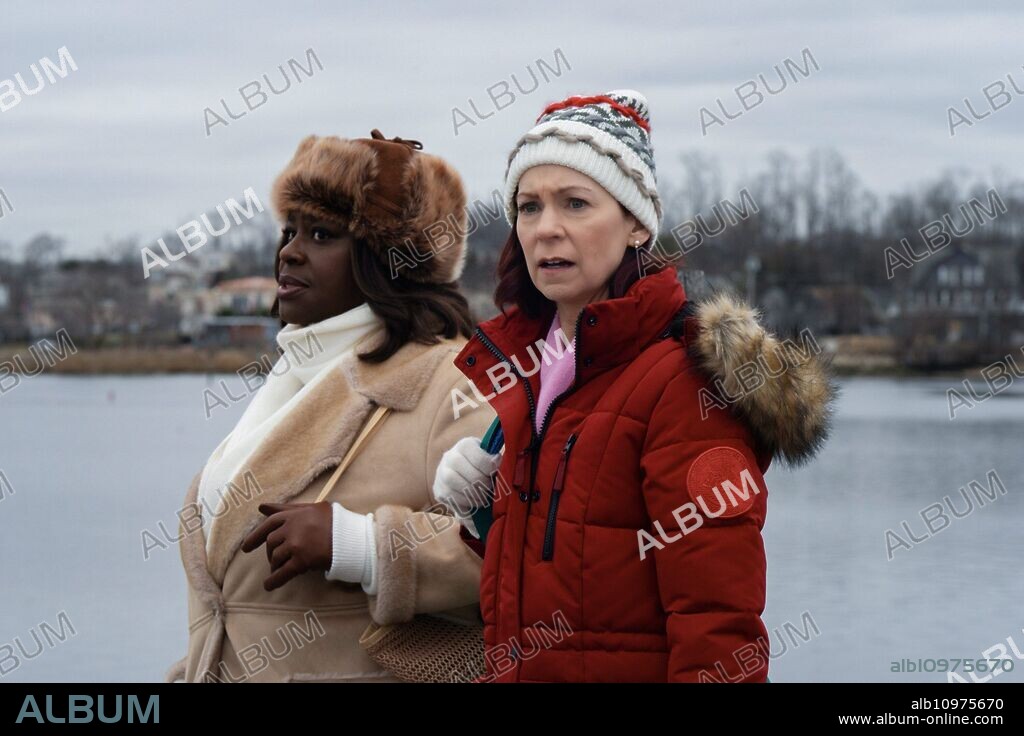 CARRIE PRESTON and Retta in ELSBETH, 2023. Copyright CBS Studios King Size Productions Lightnin' Production Rentals Scott Free Productions.