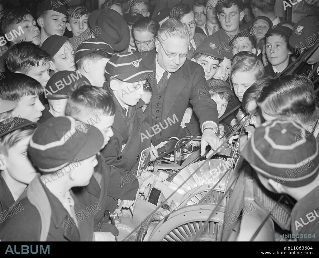 NUMBER ONE ATOM EXPERT SEES '' MARVELS FOR THE BOYS ''. SIR BEN LOCKSPEISER , Scientific adviser to the Ministry of Supply , who is Britain's No . 1. Atom expert saw some of the wonders displayed to the younger generation of this atomic age when he visited the School-boys Own Exhibition at New Horticultural Hall , London . A specialist in rocket propulsion and the freeing of aircraft from ice , Sit Ben did excellent work at the Ministry of Aircraft Production during the War . PICTURE SHOWS:- Sir Ben Lockspeiser , explains the whittle jet engine to some of the youngsters who visited the exhibition . 5 January 1949.