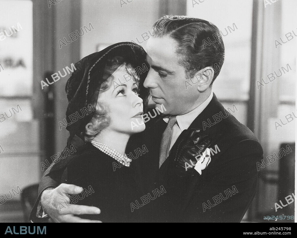 GLADYS GEORGE and HUMPHREY BOGART in THE MALTESE FALCON, 1941, directed by JOHN HUSTON. Copyright WARNER BROS/FIRST NATIONAL.