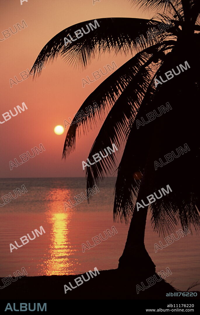 Sunset seen from the resort of West End on Roatan, largest of the Bay Islands, Honduras, Caribbean, Central America.