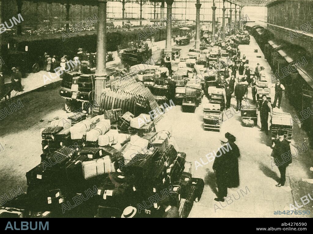'Passengers' Luggage at Talbot Road Station, Blackpool, in the Holiday Season', 1930. From "The Wonder Book of Railways", edited by Harry Golding. [Ward, Lock & Co., Limited, London and Melbourne, 1930].