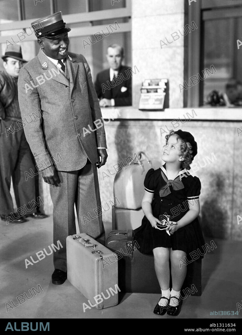 SAM MCDANIEL and SHIRLEY TEMPLE in POOR LITTLE RICH GIRL, 1936, directed by IRVING CUMMINGS. Copyright FOX FILMS.