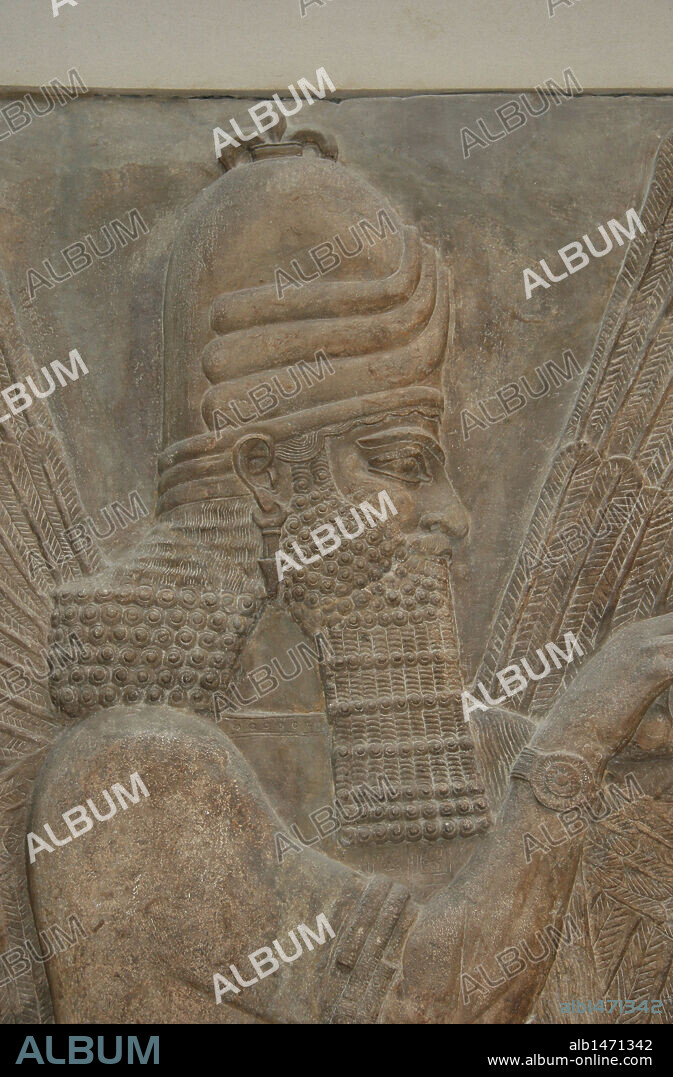Assyrian Art. "Lamasu" or Bull-man.  Reliefs from Sargon II's Palace. Genius. Dur-Sharrukin (Khorsabad). Assyria, 721-705 BC. Alabaster. 8th century BC. Louvre Museum. Paris. France.