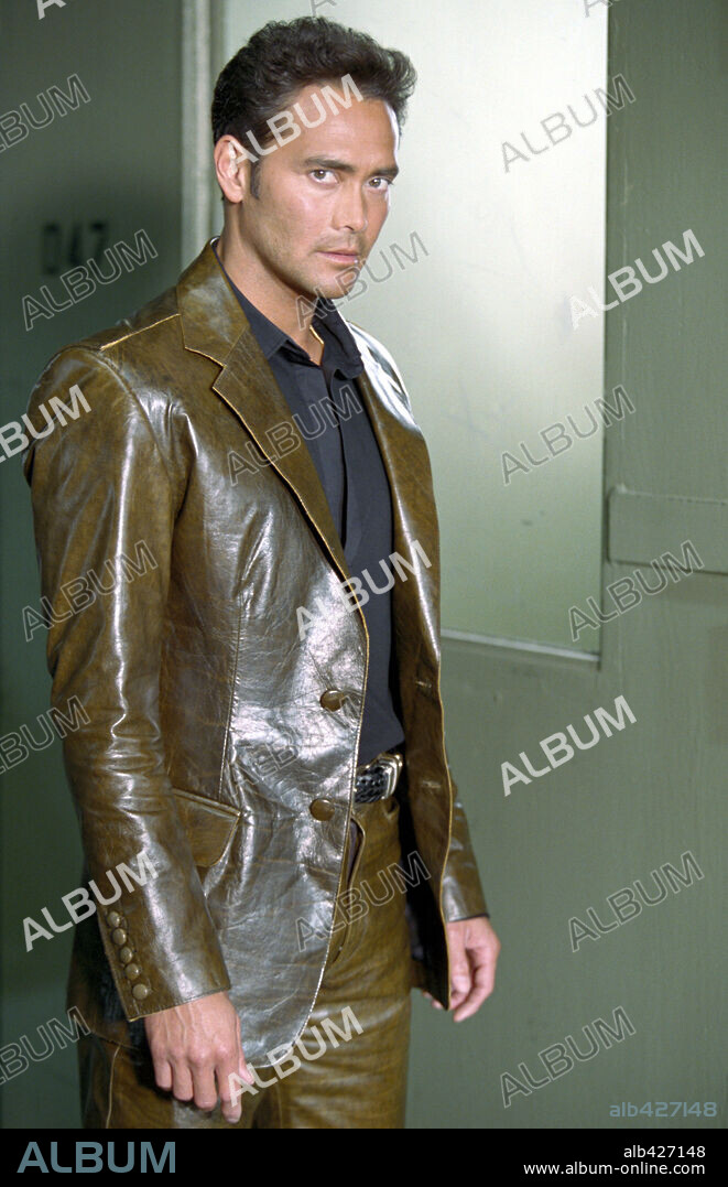 MARK DACASCOS in CRADLE 2 THE GRAVE, 2003, directed by ANDRZEJ BARTKOWIAK. Copyright SILVER PICTURES/WARNER BROS.