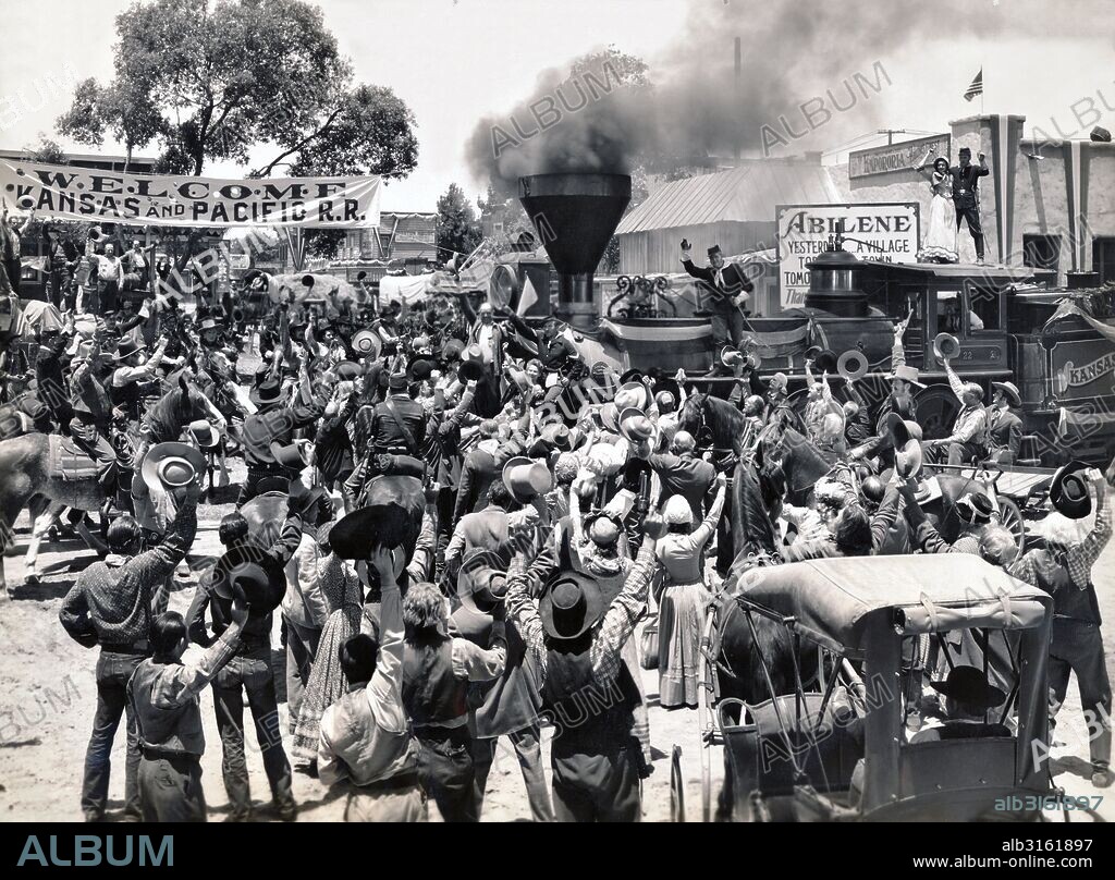 Hollywood, California: 1941. The first steam engine rolls into Abilene, Kansas in 1867 in this scene from the Columbia movie, "Texas". The engine was actually made by Baldwin Locomotive in 1861.