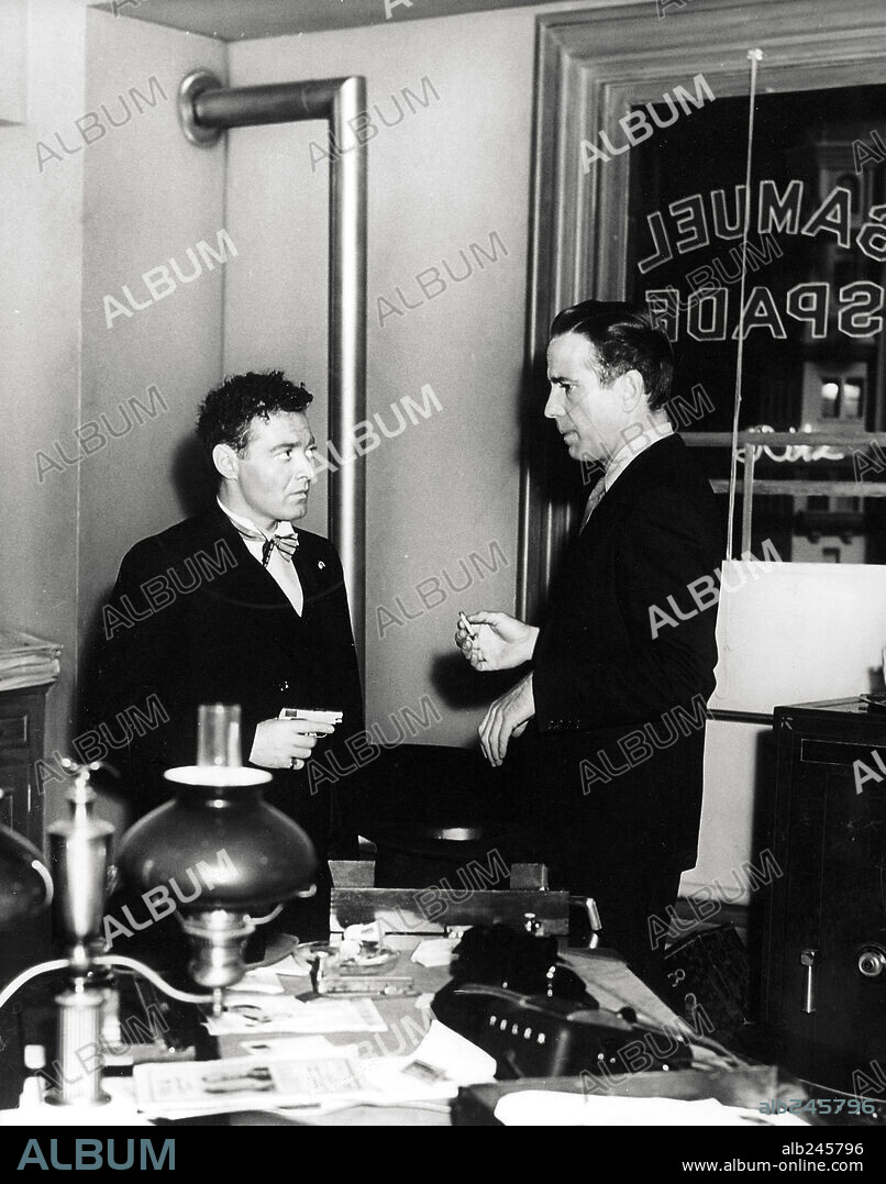 HUMPHREY BOGART and PETER LORRE in THE MALTESE FALCON, 1941, directed by JOHN HUSTON. Copyright WARNER BROS/FIRST NATIONAL.