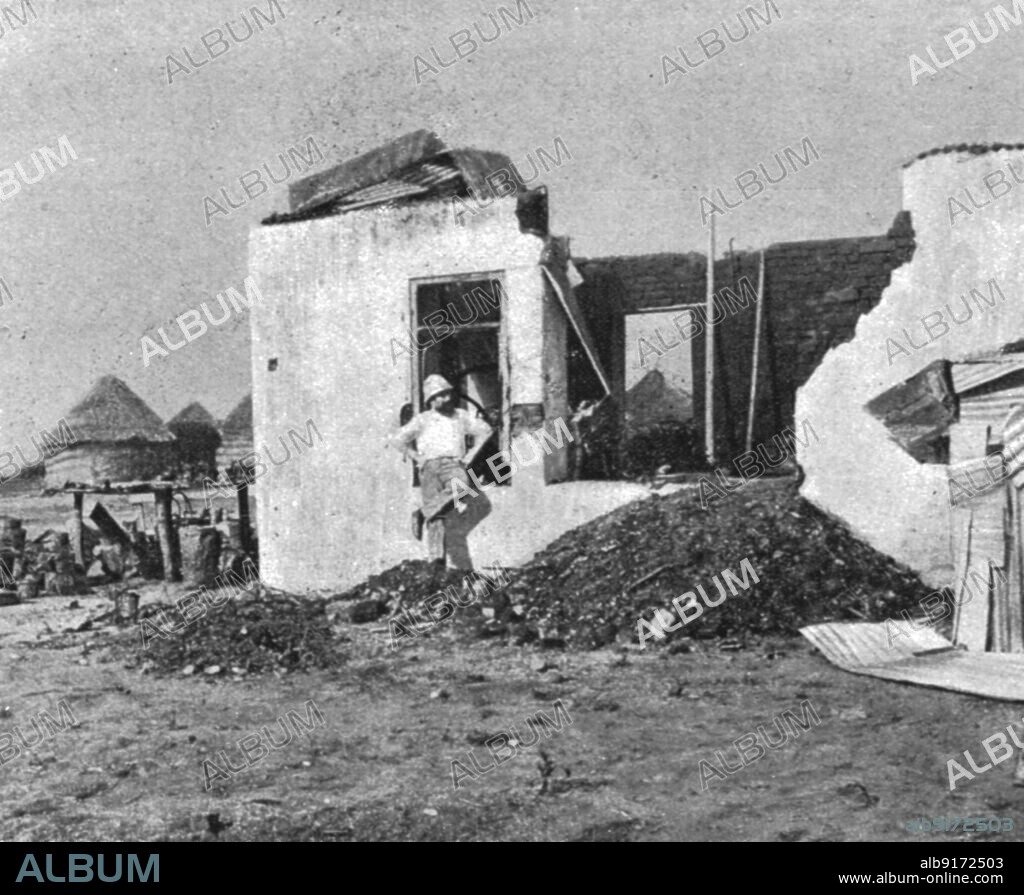 'La conquete du Cameroun; L ans l'interieur du poste allemand de Caroua : effet d'un de nos obus de 95 sur le batiment de la forge', 1915. From "Collection de la Guerre IV. L'Illustration Tome CXLVII. La Guerre Janvier, Fevrier, Mars, Avril, Mai, Juin 1916".