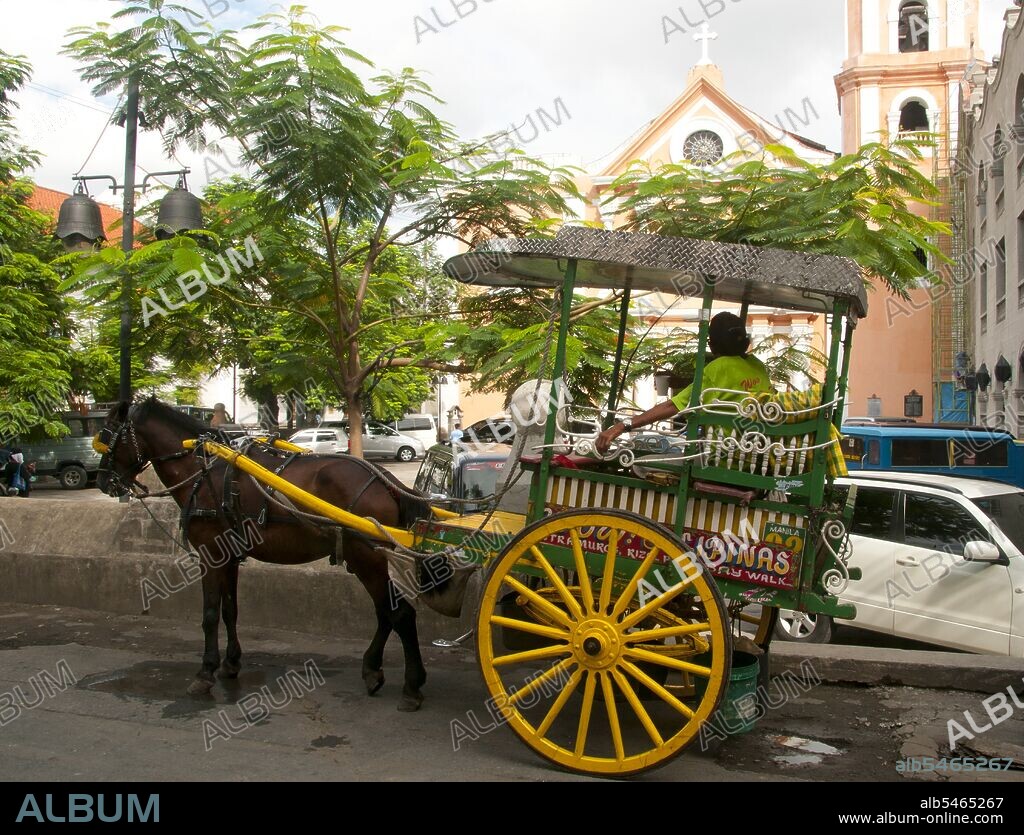 Intramuros is the oldest district and historic core of Manila. Nicknamed the 'Walled City', the fortified Intramuros was the full extent of the City of Manila and the seat of government during the Spanish Colonial Period. Its name in Latin, intramuros, literally means 'within the walls'. Districts beyond the walls of Manila were referred to as extramuros, literally 'outside the walls. 'The city was located then along Manila Bay and south of the Pasig River entrance, before 20th-century reclamations obscured the city from the bay. Guarding the city is Fort Santiago, a citadel located at the mouth of the river. Construction of its thick defensive walls were started by the Spaniards in the late 16th century to protect the seat of the Spanish government from foreign invasions (most notably British and Dutch) and raiding Chinese sea pirates.