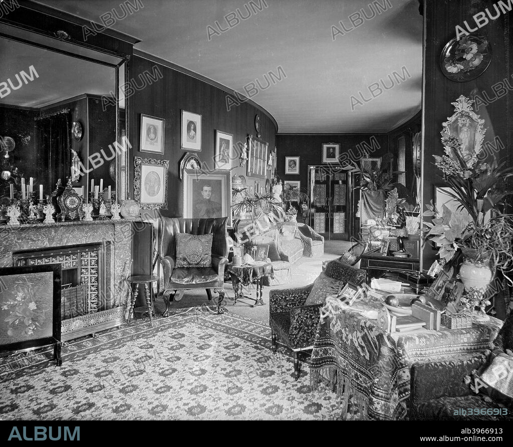 The green corridor in the White Lodge, Richmond Park, London, 1892. A Palladian villa commissioned by George II. The walls of the corridor are hung with portraits. It now houses the Royal Ballet School.