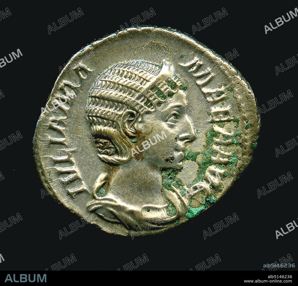 Denarius of the Iulia Mamaea, Old stock, Silver, stamped, Silver, Total: Diameter: 2.1 cm, Inscription: Av: IVLIA MAMAEA AVG, coins, numismatics, queen, empress, ruler portrait, state portrait, profile (side view), luck, fate, lot, Severus Alexander, Late Imperial Era, Roman Antiquity, Avers: portrait of the empress n.r.; circumferential inscription IVLIA MA-MAEA AUG(sta), pearl circle. Reverse: personification of Felicitas with cornucopia and heraldic staff (lat. caduceus); circumferential inscription FELICITAS PVBLICA, pearl circle. Iulia Mamaea was the mother of Emperor Alexander Severus, the last member of the Severan dynasty to sit on the Roman throne from 222 to 235 AD. In the early years, she took over the de facto government of the Roman Empire for her still very young son. On the reverse side is the seated Felicitas, the Roman personification of good fortune and happiness.