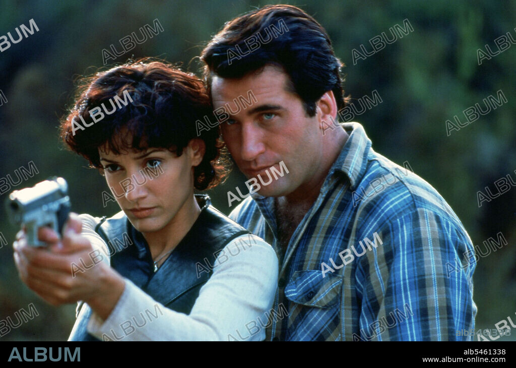 DANIEL BALDWIN and JENNIFER BEALS in DEAD ON SIGHT, 1994, directed by RUBEN PREUSS. Copyright MCEG Sterling Productions.