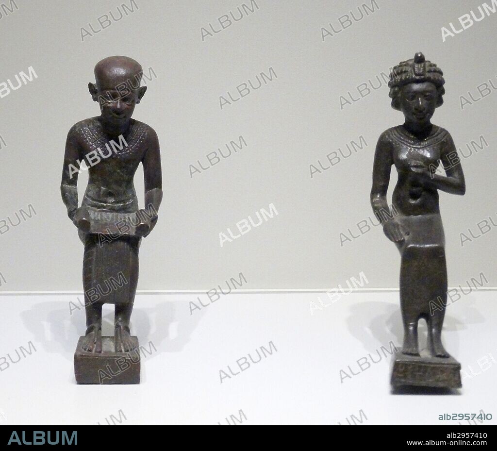 Statuettes of Imhotep and Kherduankh. Imhotep was the architect of the step pyramid at Saqqara, while Kherduankh was venerated as his mother. 3rd-2nd century.