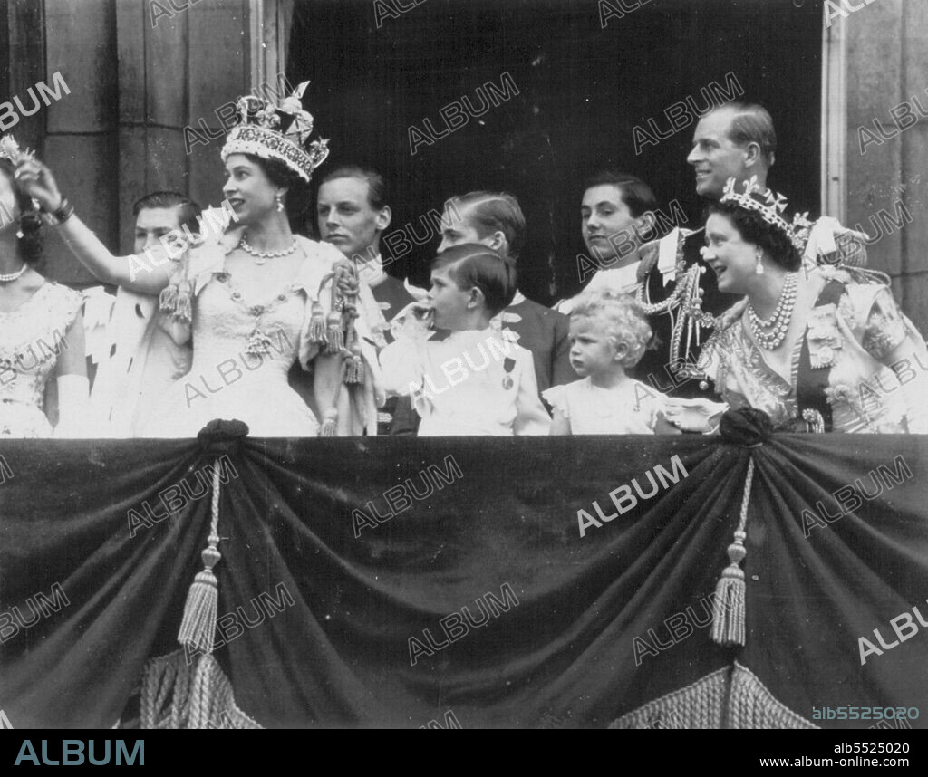 Royal Family Watches R.A.F. Coronation Salute -- Queen Elizabeth II and some members of the Royal Family stand on balcony of Buckingham Palace yesterday to watch Royal Air Force planes fly past in coronation salute. With the Queen are her son, Prince Charles, daughter Princess Anne, Queen Mother Elizabeth and the Duke of Edinburgh. At extreme left is one of the Queen's maids of honor. In rear are Queen Mother Elizabeth's four pages. June 2, 1953. (Photo by AP Wirephoto).