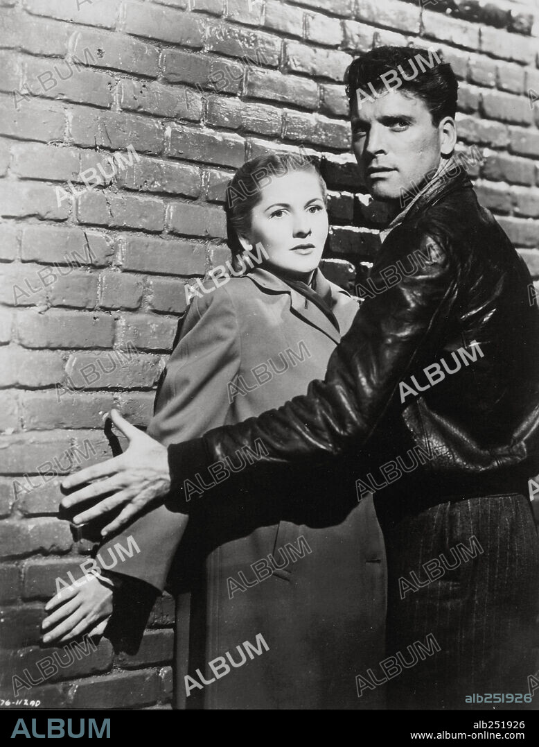 BURT LANCASTER and JOAN FONTAINE in KISS THE BLOOD ON MY HANDS, 1948, directed by NORMAN FOSTER. Copyright UNIVERSAL INTERNATIONAL.