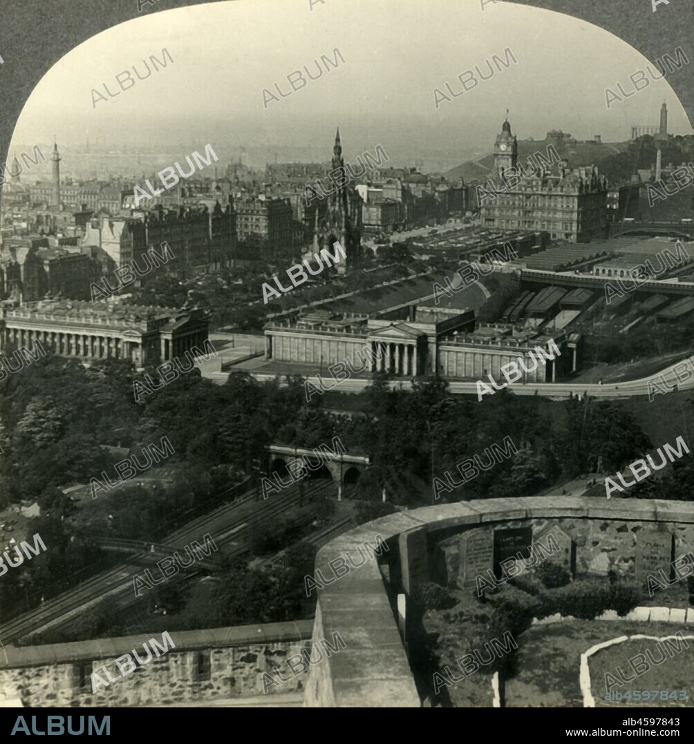 'National Gallery, Scott Monument and Princes Street, from Castle. Edinburgh, Scotland', c1930s. Scottish National Gallery and Victorian Gothic monument to Scottish author Sir Walter Scott in  Princes Street Gardens viewed from the ramparts at Edinburgh castle. From "Tour of the World". [Keystone View Company, Meadville, Pa., New York, Chicago, London].