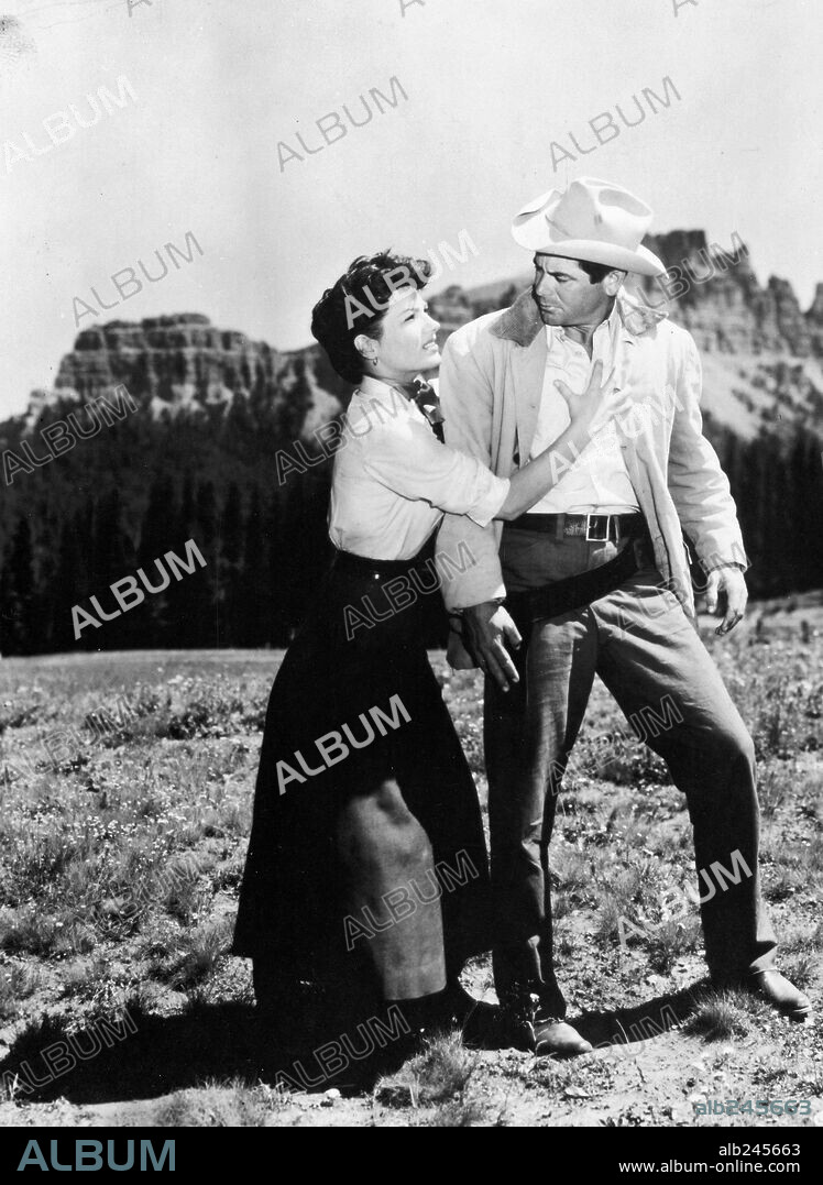 FELICIA FARR and GLENN FORD in JUBAL, 1956, directed by DELMER DAVES. Copyright COLUMBIA PICTURES.
