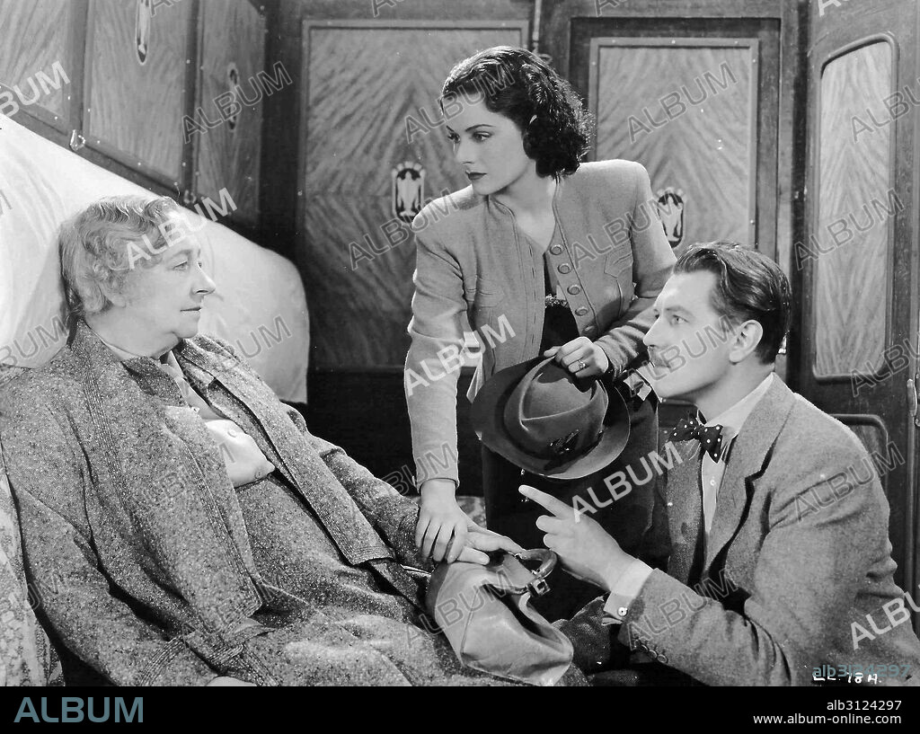 DAME MAY WHITTY, MARGARET LOCKWOOD et MICHAEL REDGRAVE dans UNE FEMME DISPARAÎT, 1938 (THE LADY VANISHES), réalisé par ALFRED HITCHCOCK. Copyright GAINSBOROUGH FILMS.