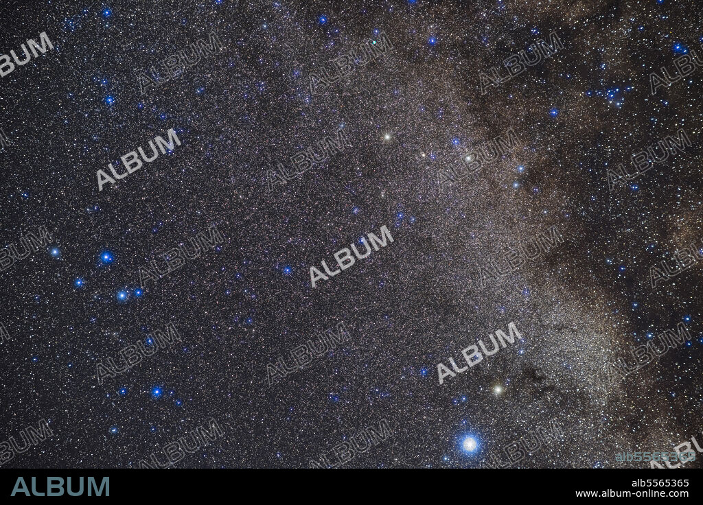 The region of the summer sky containing the small constellations of Delphinus (lower left), Sagitta (centre) and Vulpecula (top and right), though that constellation is only partly framed here. The bright star at bottom is Altair in Aquila. The Dumbbell Nebula, M27, is visible as the green globe at top. The Coathanger asterism, Cr399, is at upper right in Vulpecula.