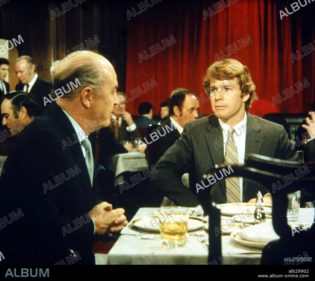RAY MILLAND and RYAN O'NEAL in LOVE STORY, 1970, directed by ARTHUR HILLER. Copyright PARAMOUNT PICTURES.