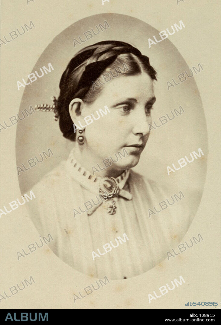 Florence Barbara Maria von Sass (August 6, 1841 - March 11, 1916) was a Hungarian-born British explorer. Orphaned during the Hungarian Revolution of 1848, she was sent to an Ottoman harem, where she lived as a chore girl until she hit puberty, when she was sold to a slave auction. Samuel Baker (June 8, 1821 - December 30, 1893) an English explorer, and big game hunter, became entranced by the teenager on the slave block. When he couldn’t outbid the pasha, he bribed the guards and Florence was allowed to escape with him. They set off to Africa in 1861, first exploring Ethiopia, then setting their sights on discovering the source of the River Nile. Gondokoro was a pivotal point in expeditions because it marked the point where explorers were forced to abandon the relative comfort upriver boats, and continue up the White Nile by foot. By the time they arrived, the expedition crew and Samuel had reached an impasse. Florence was able to negotiate an understanding and kept the expedition intact and moving forward. Progress up the White Nile was slow and much of the team eventually abandoned the Bakers. The Bakers claimed the European discovery of Murchison Falls and Lake Albert beyond. In 1865, Florence and Samuel returned to England and were married, but were not welcomed openly into formal English society. In 1869 they returned to Gondokoro as abolitionists. Photographed by Henry Maull, 1875.