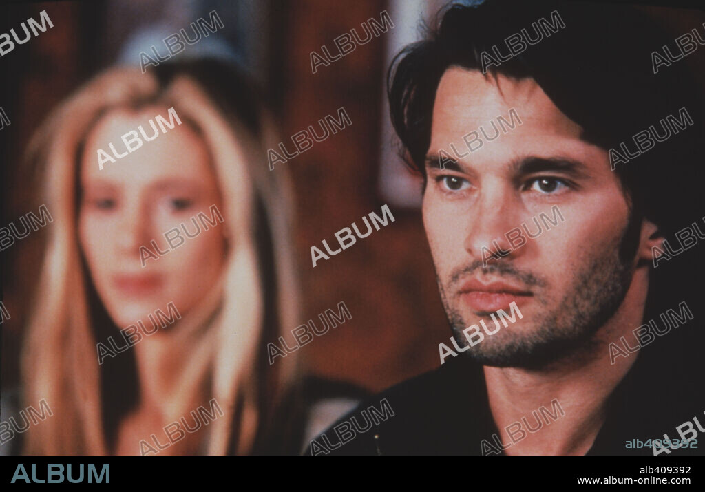 MIRA SORVINO and OLIVIER MARTINEZ in SEMANA SANTA, 2002, directed by PEPE DANQUART. Copyright EVIDENCE FILM/A WANDERING STAR/RAI/SENATOR FILM.