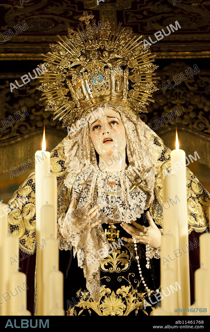 Image of Virgin Mary on float (pasos) carried during Semana Santa (Holy Week), Seville, Andalucia, Spain, Europe.