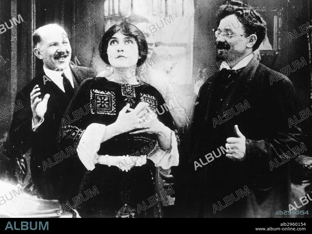 LEON TROTSKY (1879-1940).Né Lev Davidovich Bronstein. Russian Communist leader. Trotsky, at right, as a movie extra in Brooklyn with Clara Kimball Young, prior to the Bolshevik Revolution.
