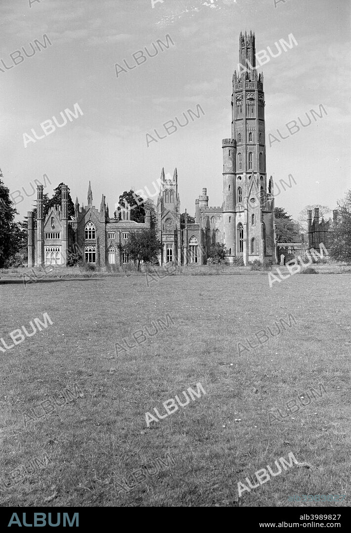Hadlow Castle, Kent, 1951. This castle was inspired by the Gothic folly of Fonthill. The dominating tower, which is 170 feet high, was added in 1838 to a slightly earlier house. The architect WB May also designed the earlier house.