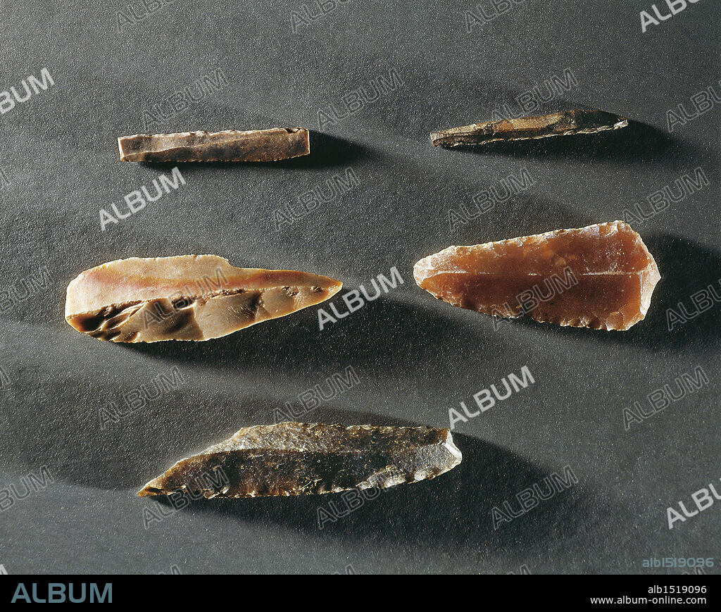 Prehistory, France, Paleolithic - Stone tools: scraper, burin, gimlet, bifacial points.