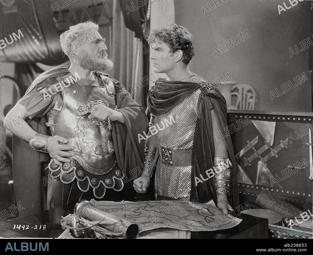 C. AUBREY SMITH and HENRY WILCOXON in CLEOPATRA, 1934, directed by CECIL B DEMILLE. Copyright PARAMOUNT PICTURES.