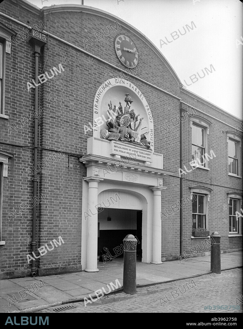Gun Barrel Proof House, Birmingham, West Midlands, 1962. Entrance and facade; the niche above the doorway contains representations of various peices of armoury. Gun Barrel Proof House was constructed in 1813 by John Horton as a result of Birmingham's increasing importance in the gun trade at the time of the Napoleonic War.