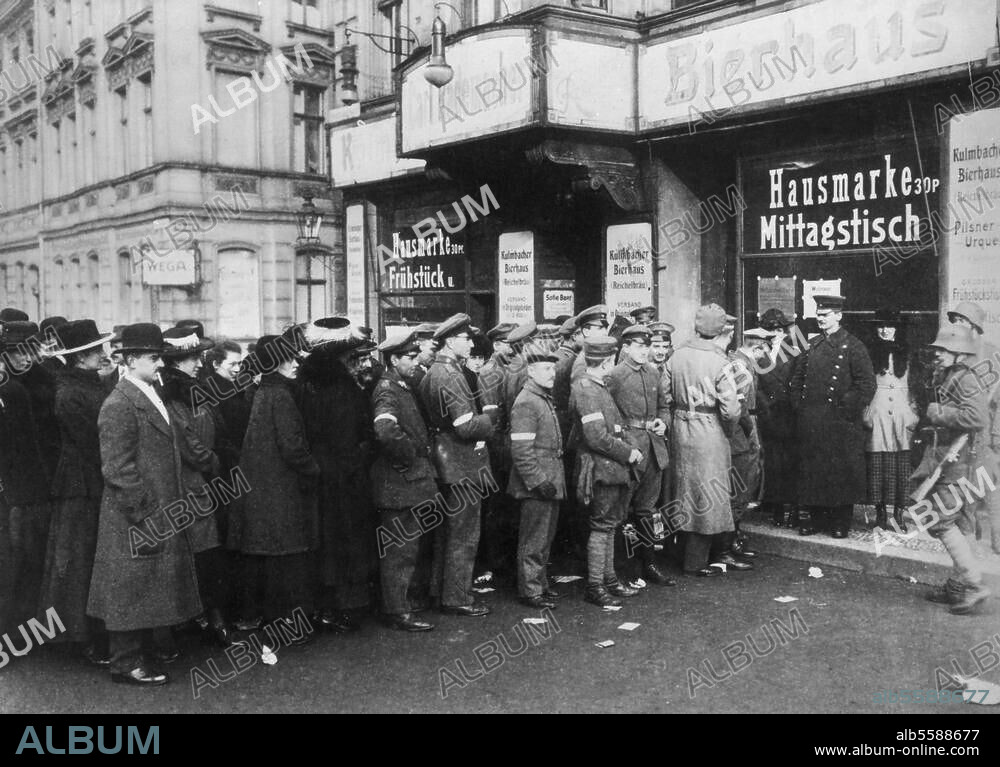 National Assembly Elections, 19 January. 1919, Berlin. Men and women wait to vote outside a Berlin polling station. Photo (Otto Haeckel).