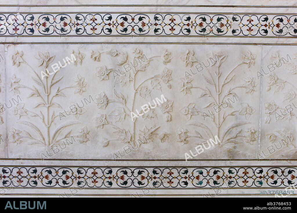 The Taj Mahal mausoleum interior by tombs of Shah Jahan and Mumtaz Mahal , Uttar Pradesh, India.