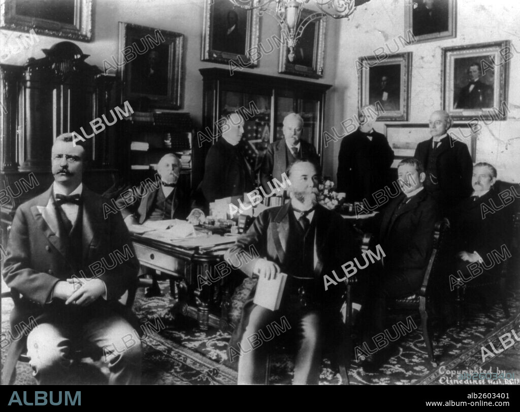 President Roosevelt & cabinet' Photograph showing President Theodore Roosevelt (1858-1919) with members of his cabinet seated and standing around a table; depicted are Lyman J. Gage, Philander C. Knox, John D. Long, John Hay, James Wilson, Elihu Root, Ethan A. Hitchcock, and Charles E. Smith.