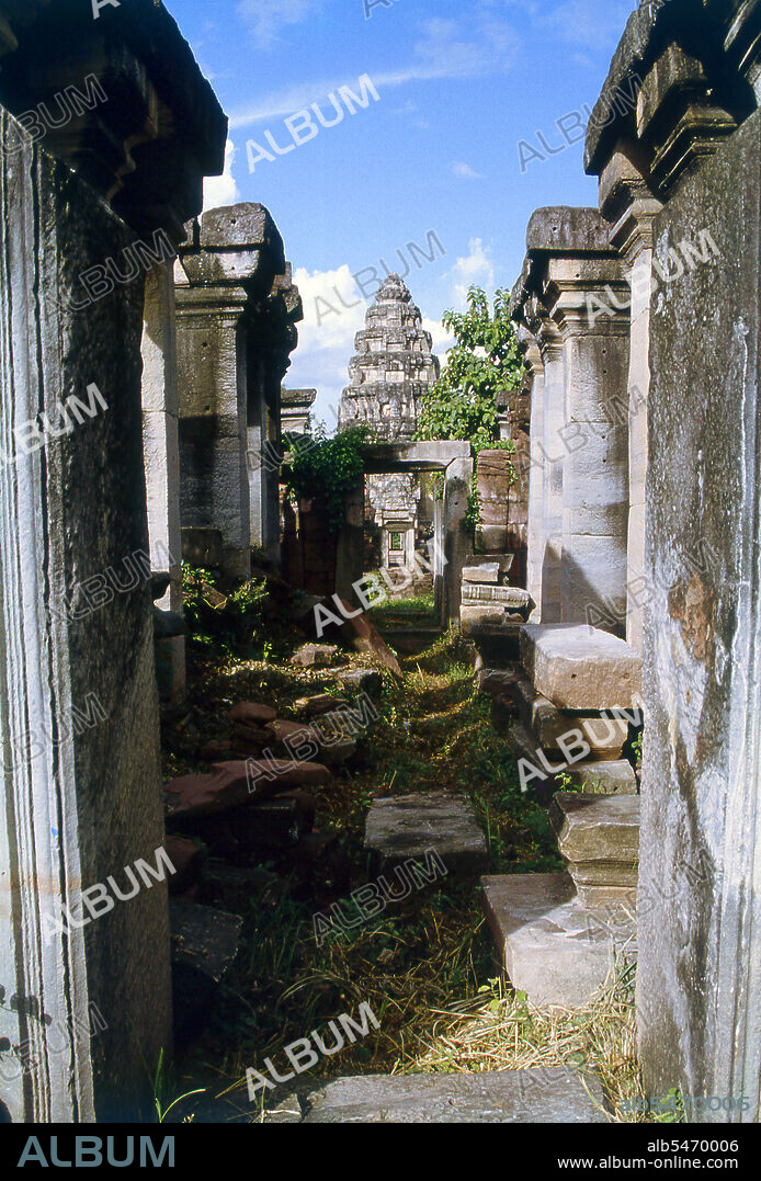 The complex at Phimai dates originally from the reign of Surayavarman II (r. 1113 - 1150), during the first part of the 12th century CE. The temple was constructed with white, finely-grained sandstone, in the same style as Angkor Wat. Like Angkor, too, Phimai was first dedicated to the cult of Vishnu. The central sanctuary tower and much of the immediate surrounding which survive today date from this early period. About one hundred years later, when Jayavarman VII (r. 1181 - 1218), 'the builder', extended and developed Phimai, the temple became a Mahayana Buddhist centre, dedicated to the Vimaya Buddha. The name 'Phimai' is derived from this. The basic structure of Jayavarman's city is readily identifiable today. The complex sits in a large rectangle which once contained a small town, and was surrounded on all four sides by water - the Mun River to the north, a natural canal to the west, and two man-made canals to the south and east. The south wall of the city was pierced by the Pratu Chai, or 'Victory Gate'. From this gateway a road led straight to Angkor, the Khmer capital.