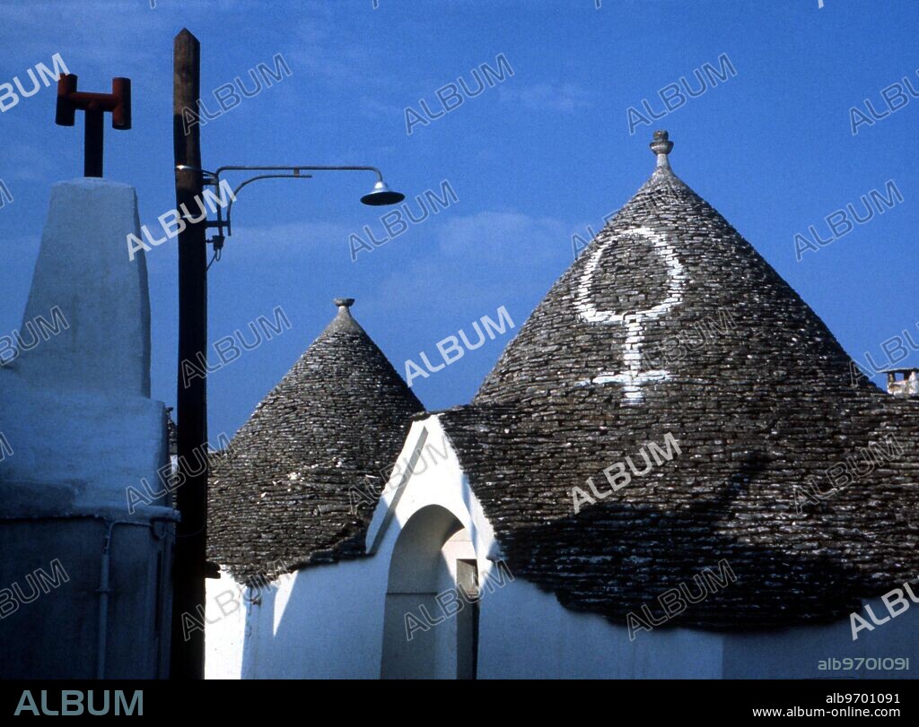 Sigil for the planet Venus, painted on one of the conical roofs of a trullo dwelling in Alberobello ('Puglia) in Italy. Many of the trulli have sigils painted upon them, ostensibly to protect those who dwell within.