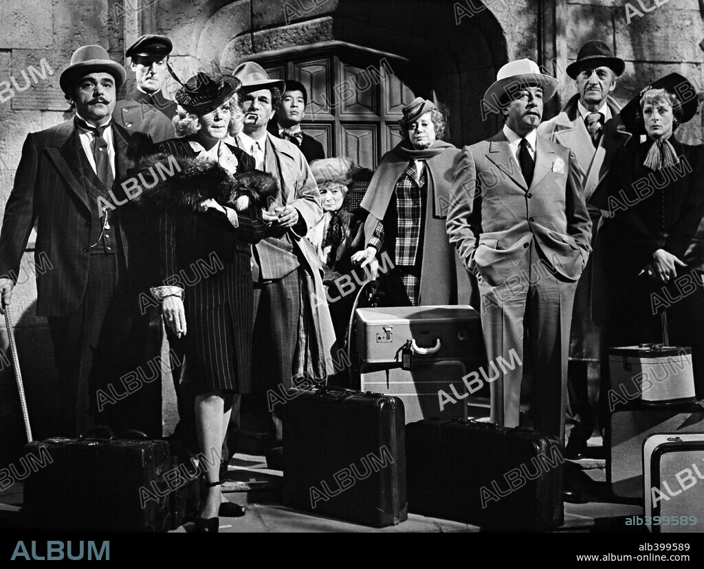 DAVID NIVEN, JAMES CROMWELL, PETER FALK and PETER SELLERS in MURDER BY DEATH, 1976, directed by ROBERT MOORE. Copyright COLUMBIA PICTURES.