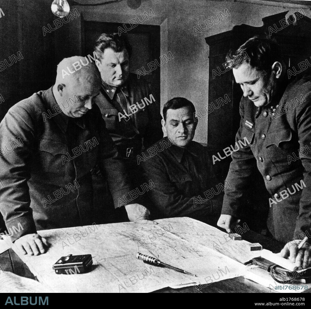Khrushchev, Eremenko and other officers during the siege of Stalingrad. Nikita Khrushchev, Andrej Eremenko and other officers studying military strategy during the siege of Stalingrad, today Volgograd. Stalingrad, August 1942.