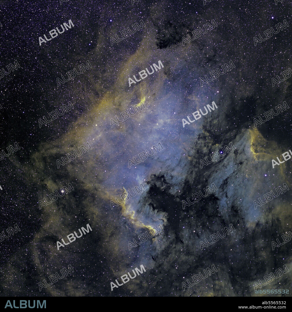 The North America Nebula (NGC 7000), an emission nebula, and the Pelican Nebula (IC 5070), an H II region within the constellation Cygnus.