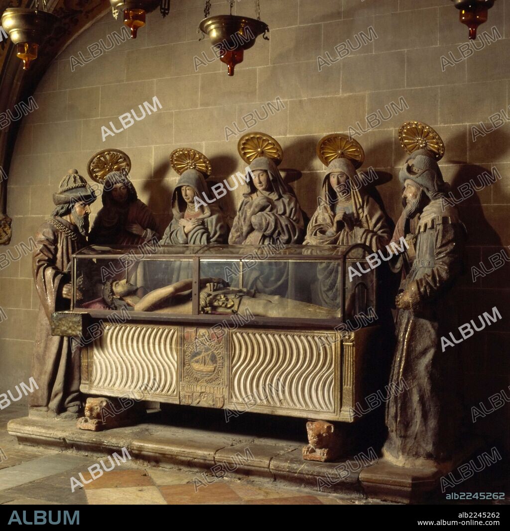 Sarcófago romano aprovechado en el gótico con un Cristo yacente rodeado de figuras representando las tres Marías, san Juan Evangelista, José de Arimatea y Nicodemo. Capilla del Santo Sepulcro, Catedral de Santa María de Tarragona.