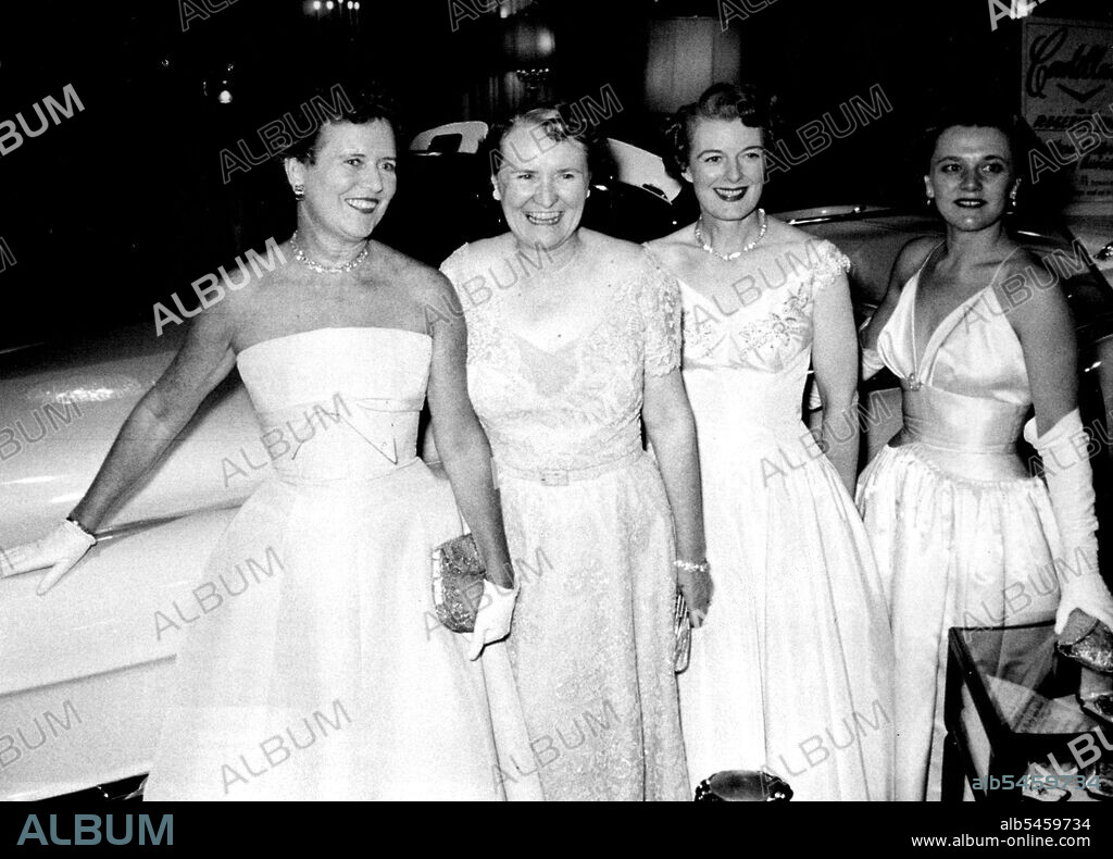 How To Raise $400,000 - Mrs. Norman Chandler, the vice president of the *****Mrs. Chandler shows off the top prize, an Eldorado Cadillac, with drive co-workers Mrs. Lemuel Bancroft and Diane Downey.The Embassy Room of Los Angeles Ambassador Hotel was aglitter as 800 leading citizens nibbled sandwiches and sipped champagne to celebrate a big event in the citys cultural life. Directed by Mrs. Norman Chandler, wife of the publisher of the Los Angeles Times, a whirlwind campaign to establish a reserve fund for the Southern California Symphony Association was reaching its $400,000 climax. Entertained by film stars, dazzled by a $2,500,000 jewel display, diverted with fabulous prizes, the guests contributed a final $40,000, boosting the total to eight times Mrs. Chandlers original goal of $50,000. The party was in truth Eldorado"a place abounding in gold. September 12, 1955. (Photo by Look Magazine).