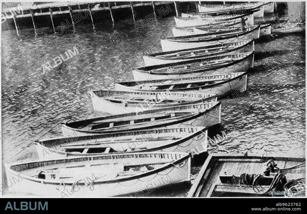 Lifeboats from the SS Titanic, 1912. All that was left of the greatest ship in the world - the lifeboats that carried most of the 705 survivors. Operated by the White Star Line, SS Titanic struck an iceberg in thick fog off Newfoundland on 14 April 1912. She was the largest and most luxurious ocean liner of her time, and thought to be unsinkable. In the collision five of her watertight compartments were compromised and she sank. Out of the 2228 people on board, only 705 survived. A major cause of the loss of life was the insufficient number of lifeboats she carried.