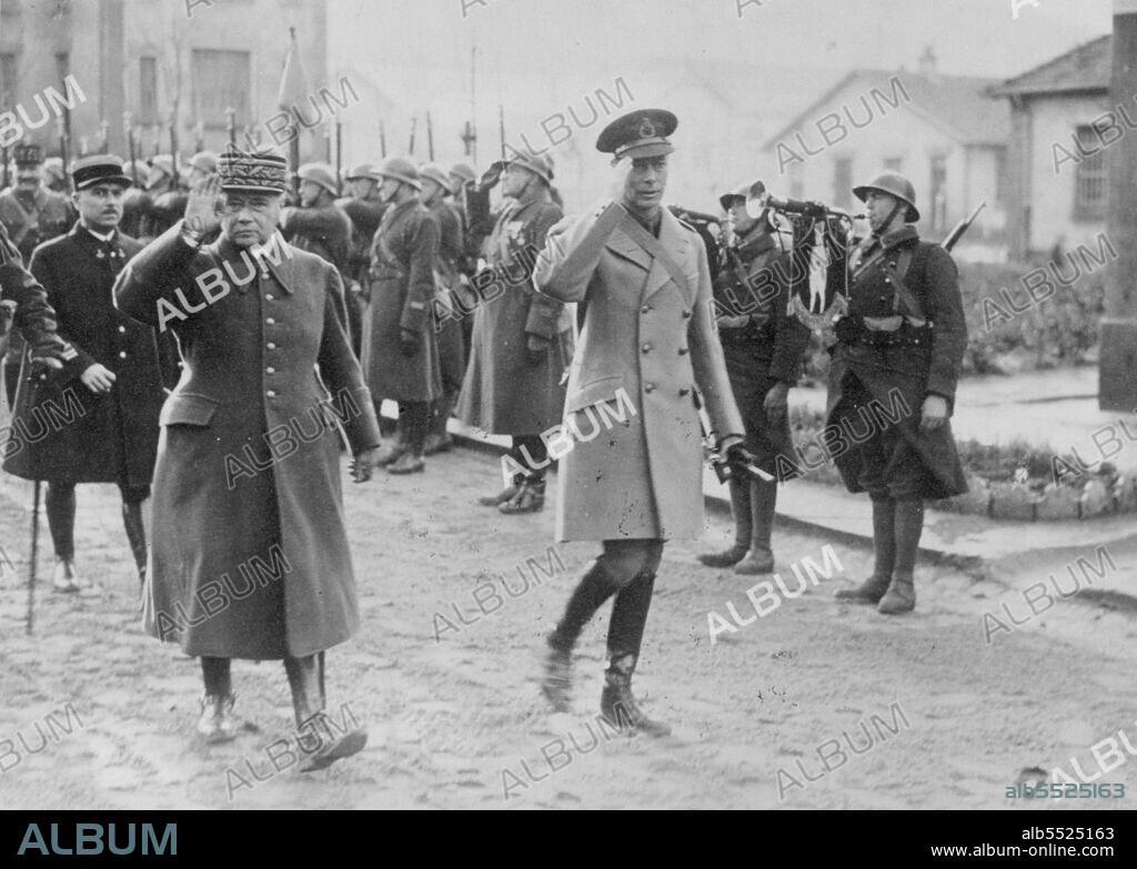 King George in France: His Majesty King George and General Gamelin arrive at one of the villages in the war zone during the King's visit to France. December 15, 1939. (Photo by The Times).