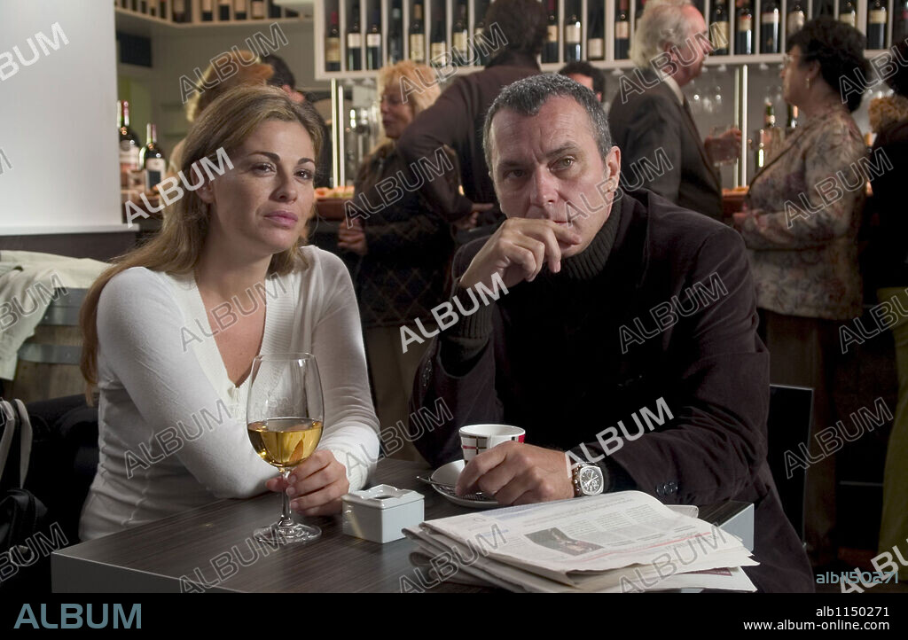 JOSE CORONADO and VANESSA INCONTRADA in TODOS ESTAMOS INVITADOS, 2008, directed by MANUEL GUTIERREZ ARAGON. Copyright CIPI CINEMATOGRAFICA.